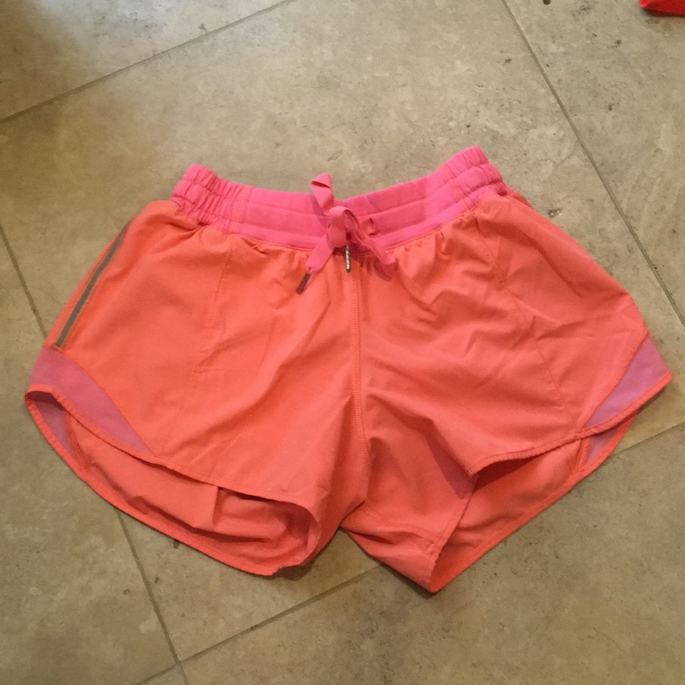 Neon pink Lululemon shorts